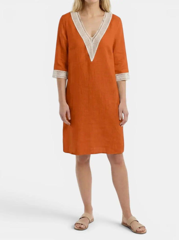 Women's knee-length woven dress with round neck and short sleeves, elegant and stylish outfit by LondonLaneStore.