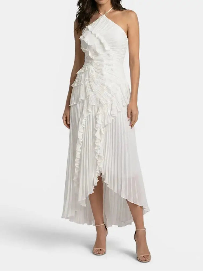 Women's pleated fabric maxi dress with ruffled halter neckline, elegant summer gown, showcasing flowing fabric and stylish design.