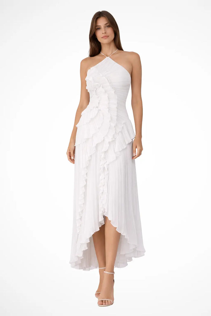 Women’s pleated fabric maxi dress with layered ruffle halter design, featuring flowing fabric and elegant style.