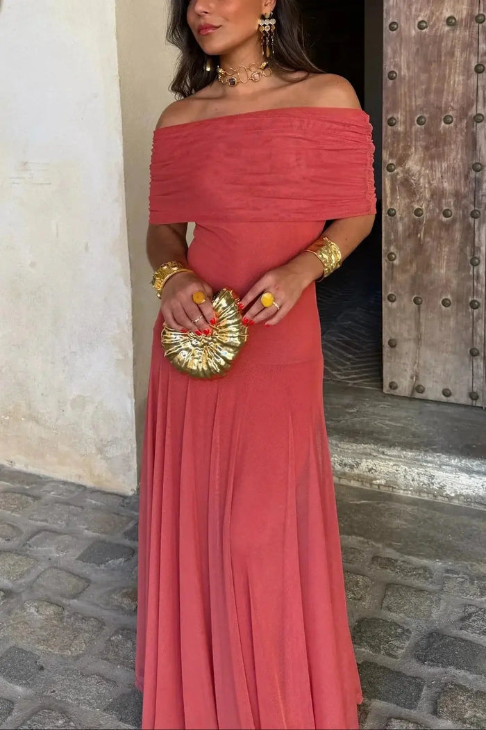 Women’s pleated polyester maxi dress with flowing asymmetrical hem, ideal for summer evening wear, by LondonLaneStore.