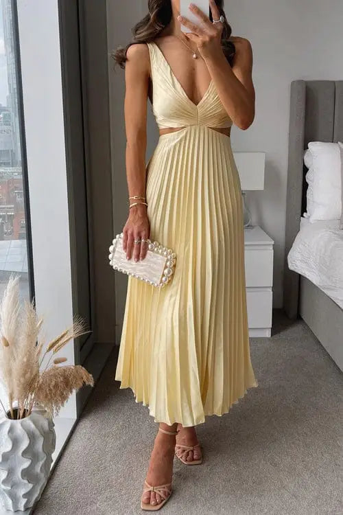 Women's pleated polyester midi dress with flowing V-neck design, perfect for summer, featuring elegant pleats and a flattering silhouette.