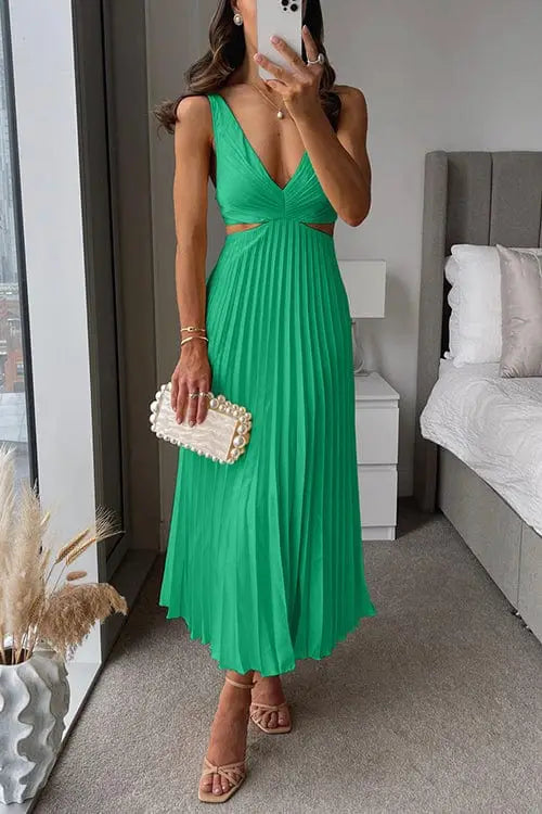 Women’s pleated polyester midi dress with flowing fabric and V-neck design, perfect for summer occasions.