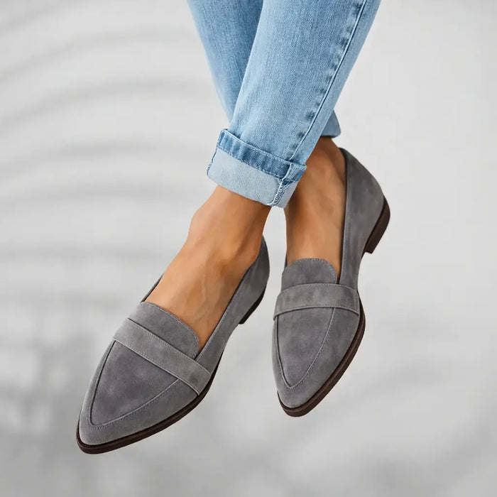 Women’s polished leather loafers with sleek toe design, slip-on style, elegant finish, perfect for stylish and comfortable footwear.