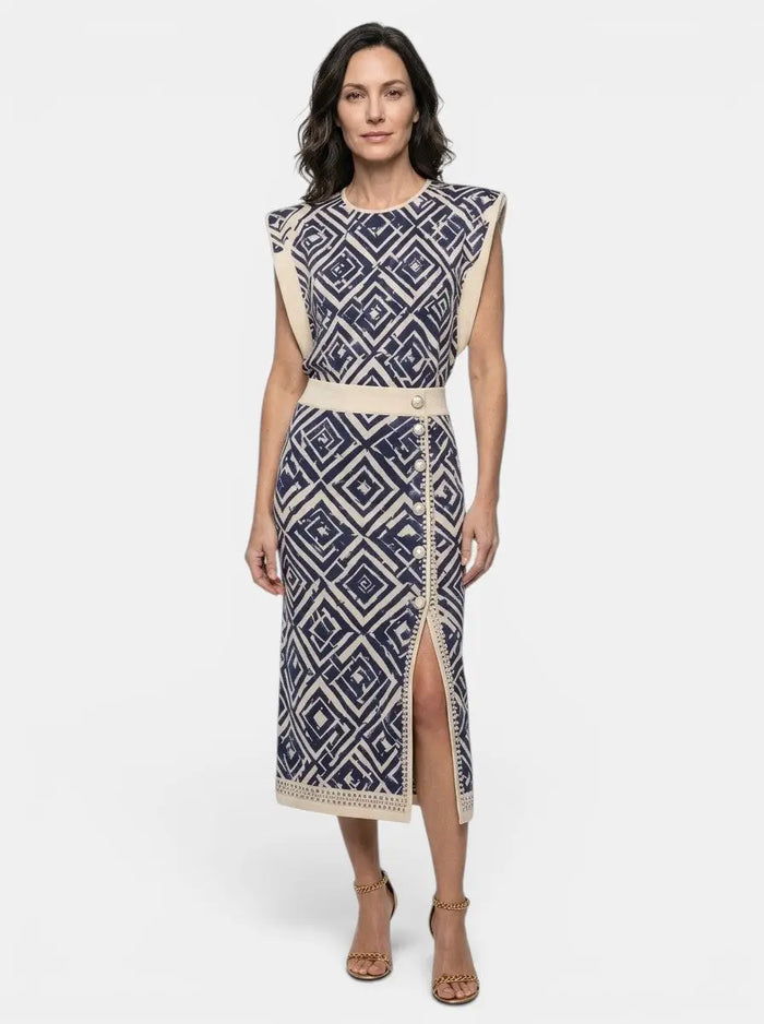 Women's polka dot print two-piece set by LondonLaneStore featuring a tailored sleeveless top and high-waist midi skirt.