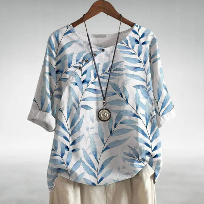 Women’s printed cotton blouse by LondonLaneStore, relaxed fit summer top with 3/4 sleeves and floral pattern.