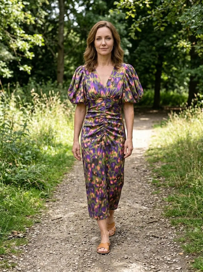 Women's printed midi dress with puff sleeves by LondonLaneStore, perfect for summer, featuring a stylish and elegant design.