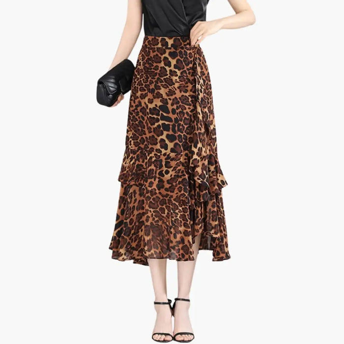 Women’s printed woven midi skirt by LondonLaneStore featuring a straight cut and side split design.