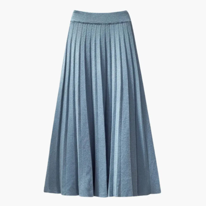 Women's ribbed knit pleated maxi skirt with flowing ankle-length design and elegant textured fabric.