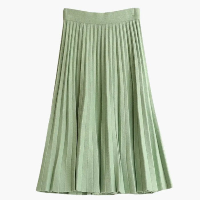 Women's ribbed knit pleated maxi skirt with flowing ankle-length design and elegant textured fabric, stylish and comfortable.