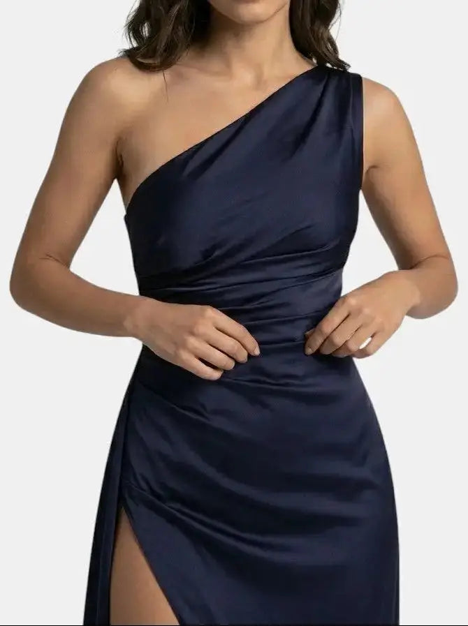 Elegant women's satin asymmetric evening maxi dress with one-shoulder design, featuring a flowing silhouette and stylish formal gown details.