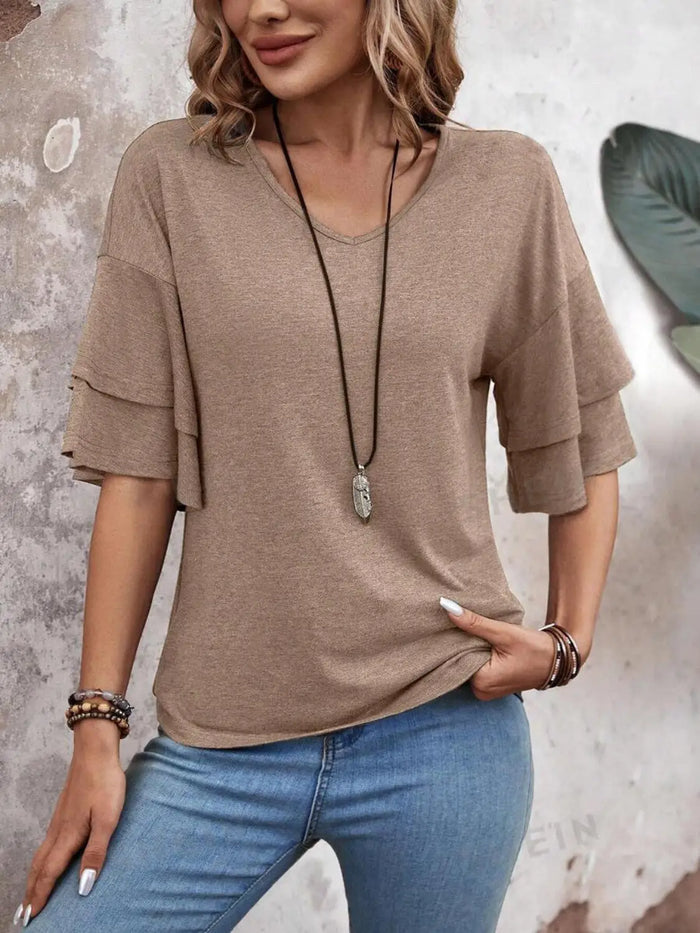 Women’s sheer white blouse with elegant half sleeves, perfect for summer, from LondonLaneStore.