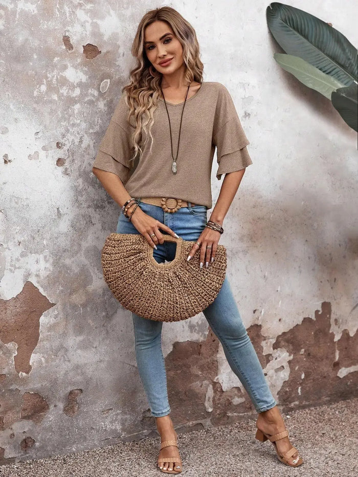 Women’s sheer white blouse with elegant half sleeves, perfect for summer, from LondonLaneStore. Light, airy, and stylish.