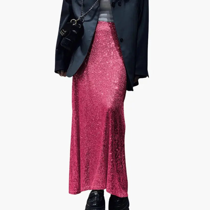 Shimmering sequin high-waisted maxi skirt for women, elegant evening wear with a flowing silhouette and sparkling detail.