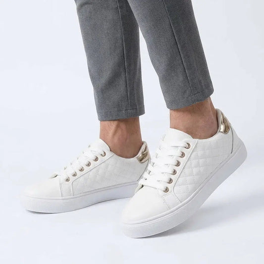 Women's white quilted lace-up sneakers by LondonLaneStore, stylish low-top casual shoes with a smooth finish and comfortable fit.