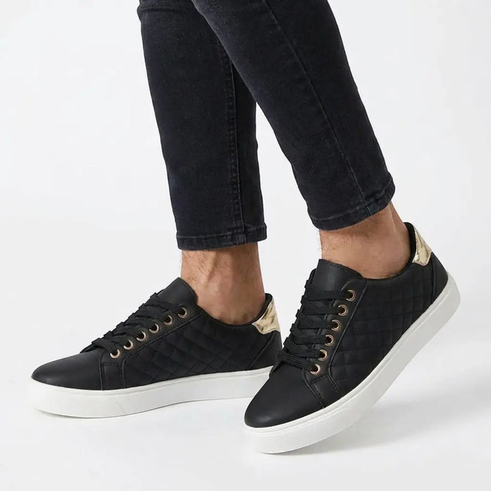 Women's white quilted lace-up sneakers with low-top design, stylish casual shoes from LondonLaneStore.