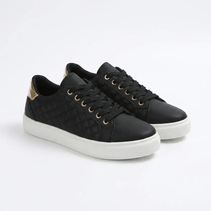 Women's white quilted lace-up sneakers from LondonLaneStore, low-top casual shoes with a smooth, stylish design.