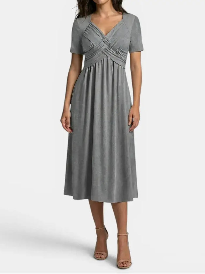 Elegant women's soft A-line midi dress with tummy control, suitable for cocktail wear, from LondonLaneStore.