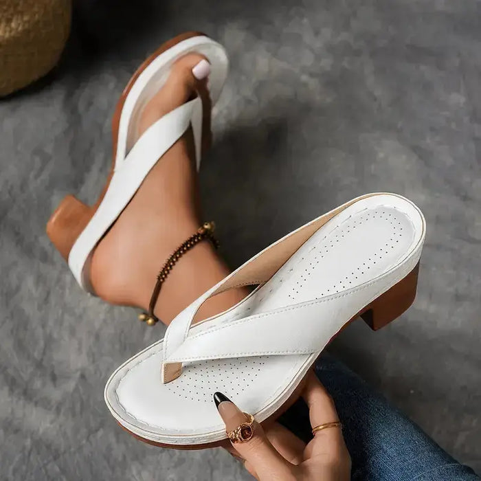 Women’s soft fabric orthopedic slippers with supportive soles, designed for comfort and everyday wear.