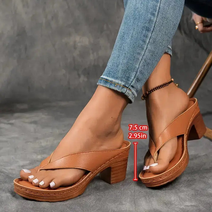 Women's orthopedic slippers with soft fabric upper, supportive sole, and cozy design for comfortable indoor footwear.