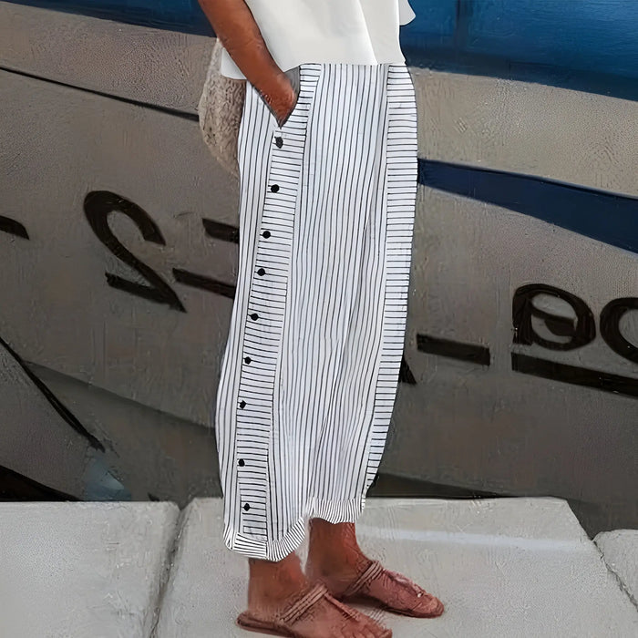 Women’s soft fabric straight-leg pants in relaxed fit with side pockets, perfect for everyday comfort.