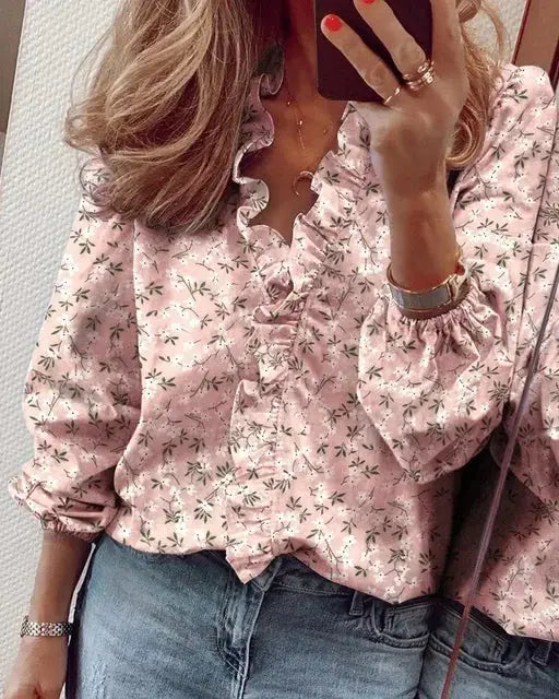 Women's soft polyester blouse with romantic ruffled neckline and long sleeves, perfect for summer, by LondonLaneStore.