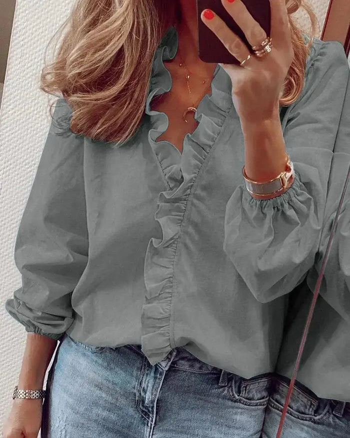 Women's soft polyester blouse with romantic ruffled neckline and puff sleeves, stylish top from LondonLaneStore.