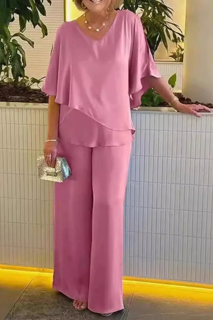 Women’s cobalt blue loungewear set featuring a relaxed batwing top and wide-leg trousers, perfect for comfortable casual wear.