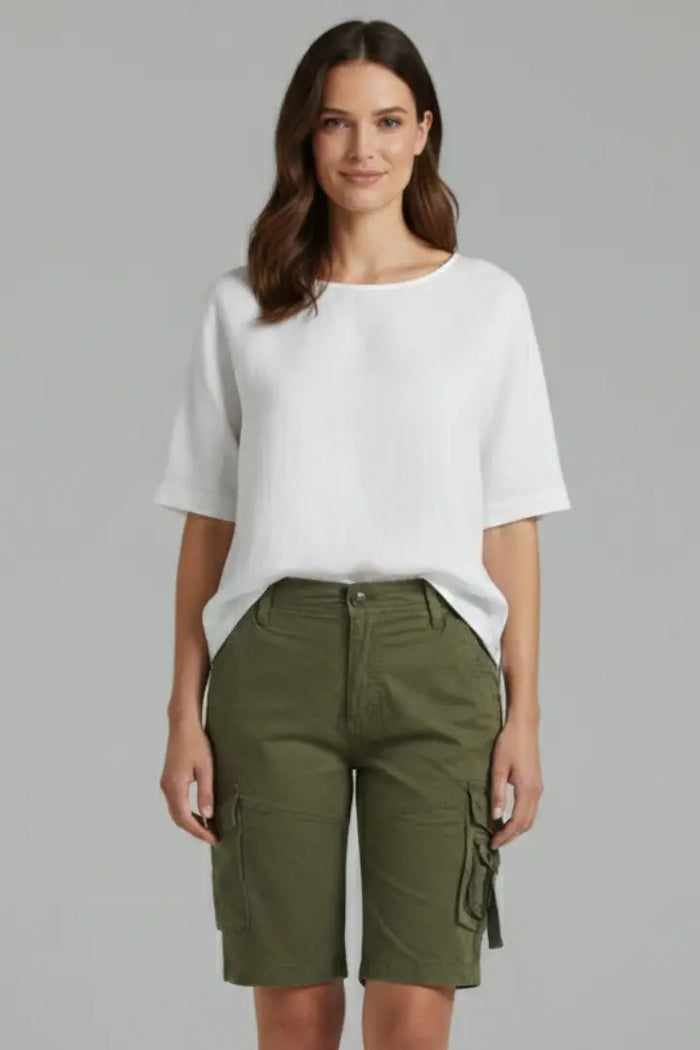 Women's structured cotton cargo shorts with a modern relaxed fit, beige color, and functional pockets for summer casual wear.