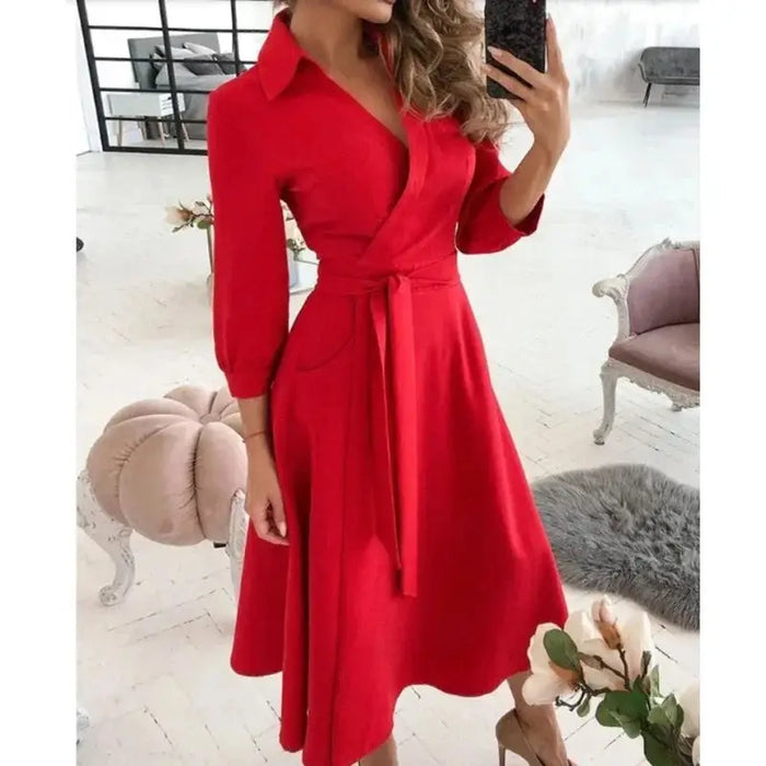 Women's structured fabric blazer dress with tailored fit and belted design, perfect for elegant and sophisticated style.