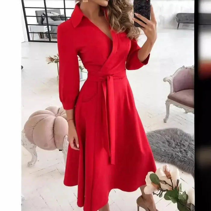 Women's structured fabric blazer dress with tailored fit and belted design, featuring elegant details for sophisticated style.
