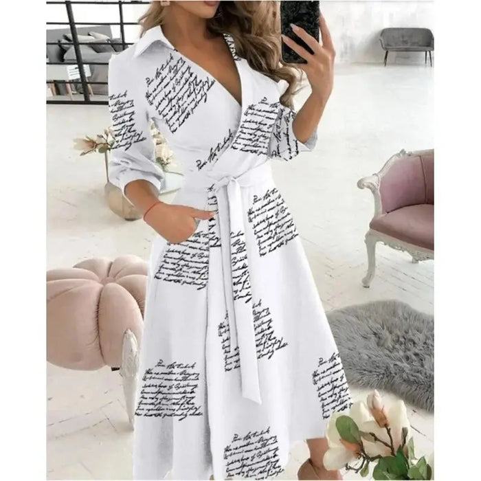 Women's structured fabric blazer dress with tailored belt and elegant design, showcasing a chic, fitted silhouette.