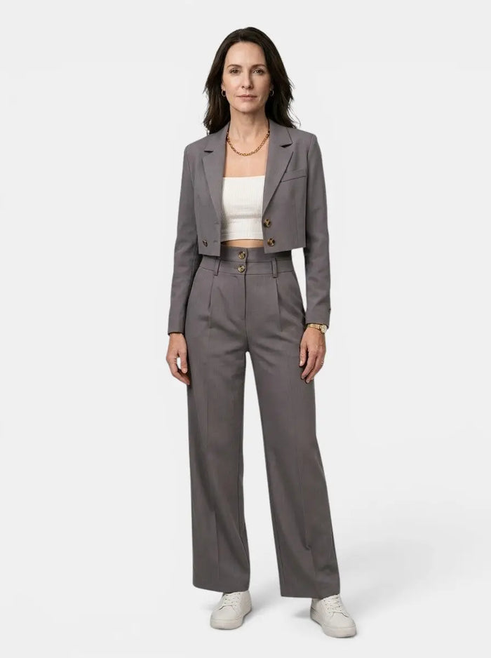 Women's structured pant suit featuring a tailored cropped blazer and high-waist wide-leg trousers from LondonLaneStore.