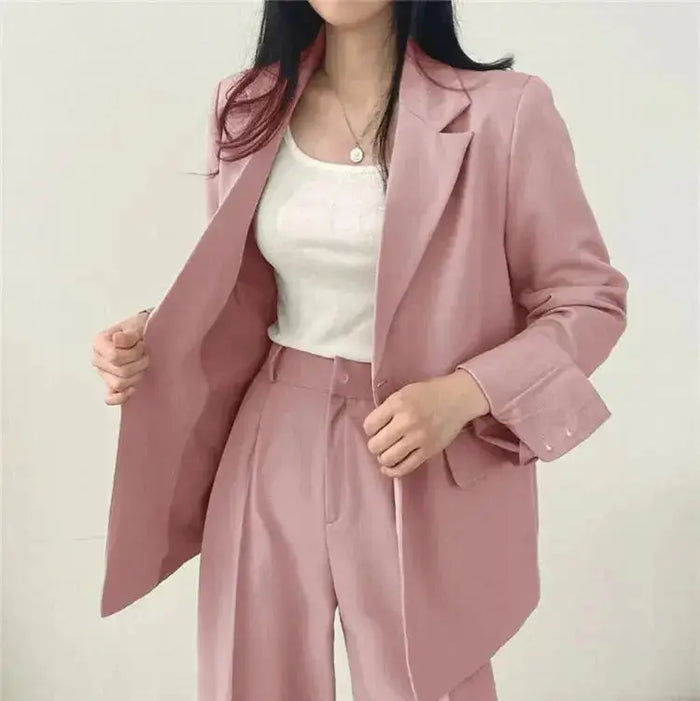 Elegant tailored women's blazer suit set by LondonLaneStore featuring a structured blazer and wide-leg trousers.