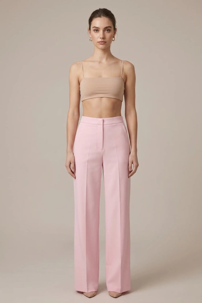Women’s tailored blazer with feather cuffs and elegant straight-leg trousers, perfect for a sophisticated all-season outfit.