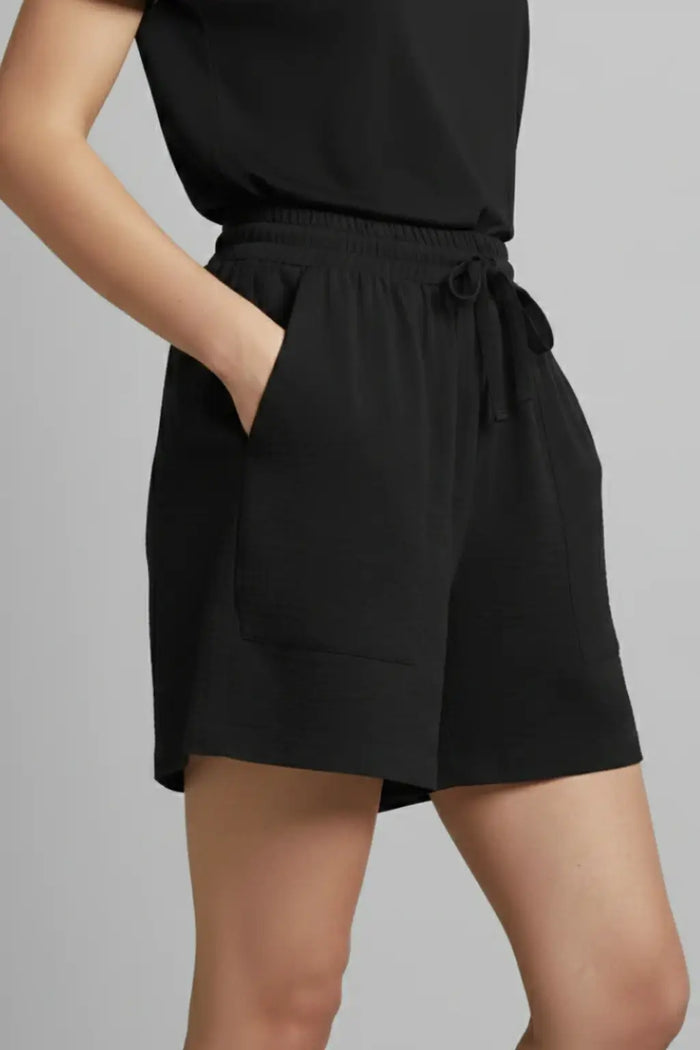 Women’s textured fabric casual shorts with drawstring waist and pockets, from LondonLaneStore.