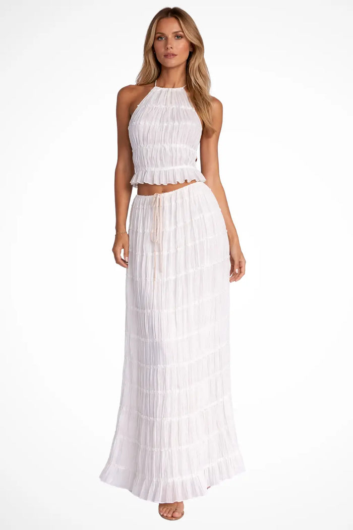 Women’s textured ruched maxi skirt set with stylish halter top, two-piece summer outfit, featuring a fashionable women's suit from LondonLaneStore.