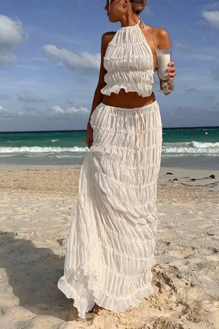 Women's textured ruched maxi skirt set with stylish halter top, perfect for summer, by LondonLaneStore.