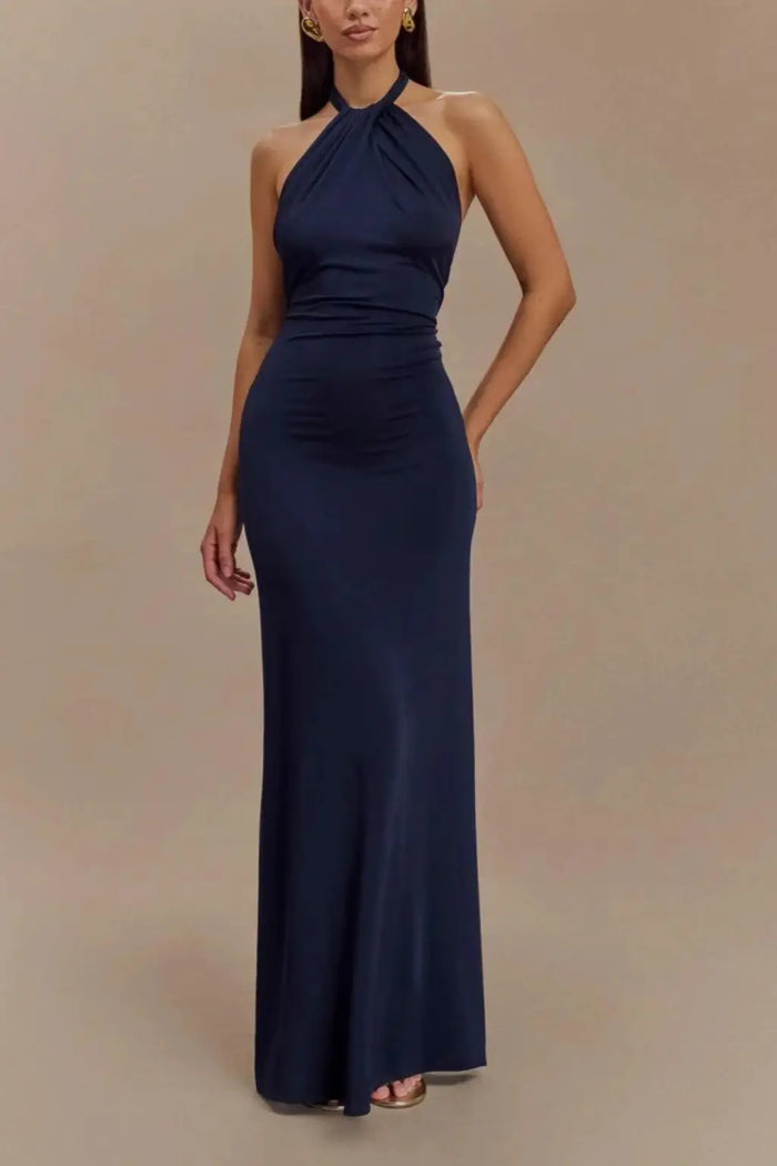 Women's twisted knot open-back maxi dress with a sleek bodycon silhouette, featuring elegant design details.