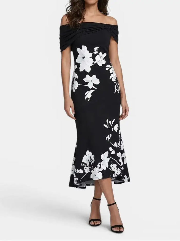 Women's unique print midi dress from LondonLaneStore, elegant, soft, breathable summer dress with a stylish design.