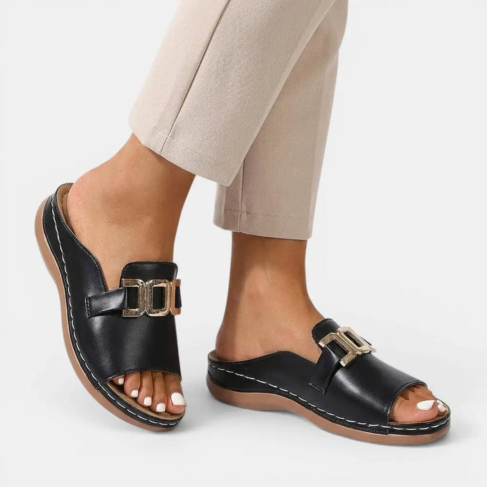 Women's vegan leather orthopedic sandals with chic wedge heels and cushioned footbeds, designed for comfort and style.
