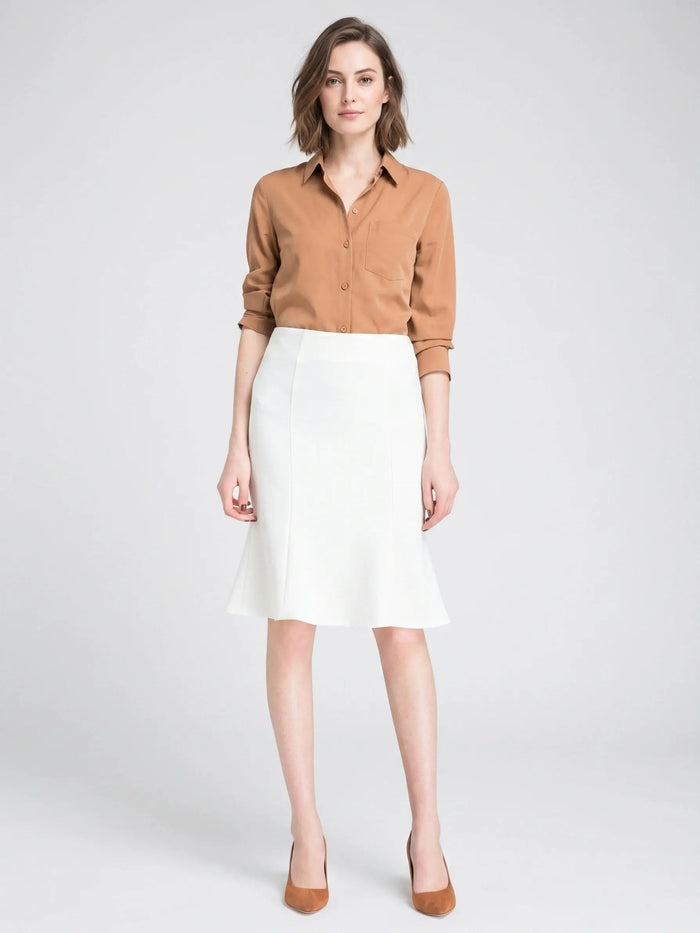 Women's woven A-line midi skirt with flared design and elastic waistband, ideal for casual office wear and elegant occasions.