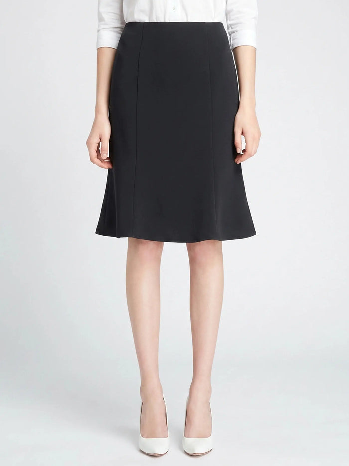 Women's woven A-line midi skirt with flared silhouette, elastic waist, and pull-on design, ideal for casual or office wear.