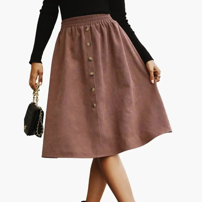 Women's woven midi skirt by LondonLaneStore featuring a straight cut and button details, showcasing a stylish and elegant design.